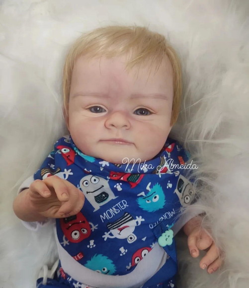 Bebê Reborn Noah menino loiro corpo silicone