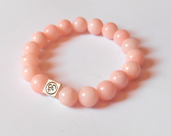 Pulseira Jade rosa e simbolo OM
