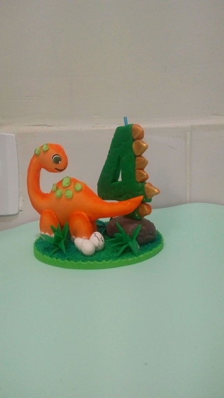 Topo de bolo vela dinossauro