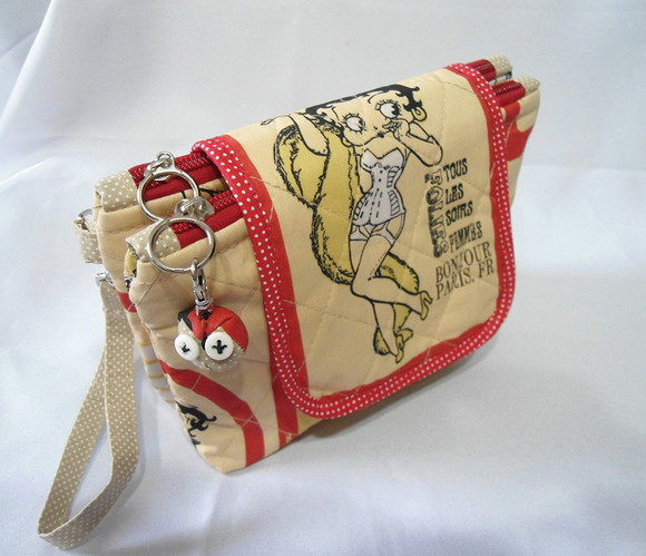 Necessaires e bolsas de mão